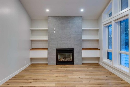3416 Lane Crescent Sw, Calgary, AB - Indoor Photo Showing Other Room With Fireplace