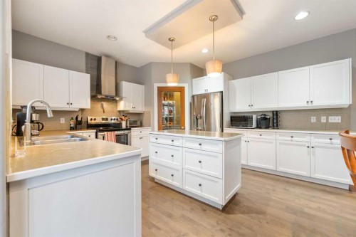 4 Crestridge Way Sw, Calgary, AB - Indoor Photo Showing Kitchen With Stainless Steel Kitchen With Double Sink