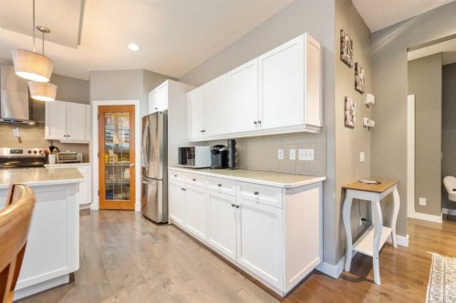 4 Crestridge Way Sw, Calgary, AB - Indoor Photo Showing Kitchen With Stainless Steel Kitchen