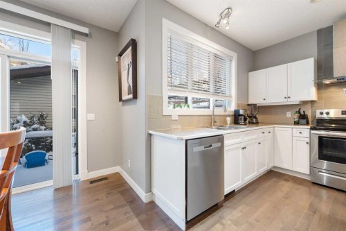 4 Crestridge Way Sw, Calgary, AB - Indoor Photo Showing Kitchen With Stainless Steel Kitchen With Double Sink