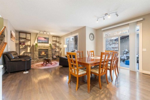 4 Crestridge Way Sw, Calgary, AB - Indoor Photo Showing Other Room With Fireplace