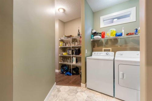 4 Crestridge Way Sw, Calgary, AB - Indoor Photo Showing Laundry Room