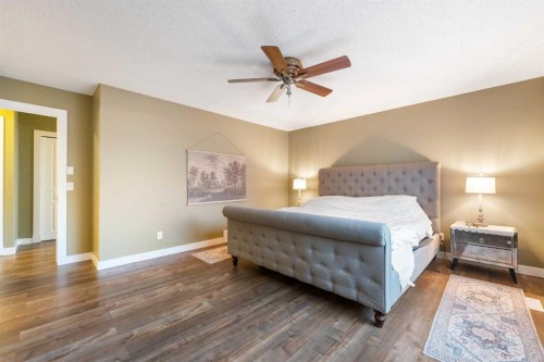 4 Crestridge Way Sw, Calgary, AB - Indoor Photo Showing Bedroom