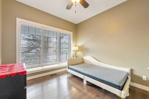 4 Crestridge Way Sw, Calgary, AB - Indoor Photo Showing Bedroom