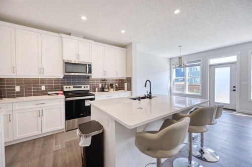 38 Setonstone Green Se, Calgary, AB - Indoor Photo Showing Kitchen With Stainless Steel Kitchen With Upgraded Kitchen