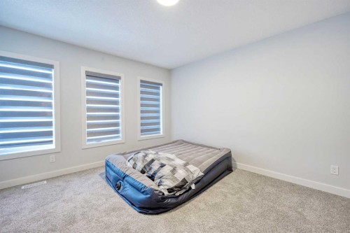 38 Setonstone Green Se, Calgary, AB - Indoor Photo Showing Bedroom