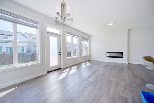 38 Setonstone Green Se, Calgary, AB - Indoor With Fireplace