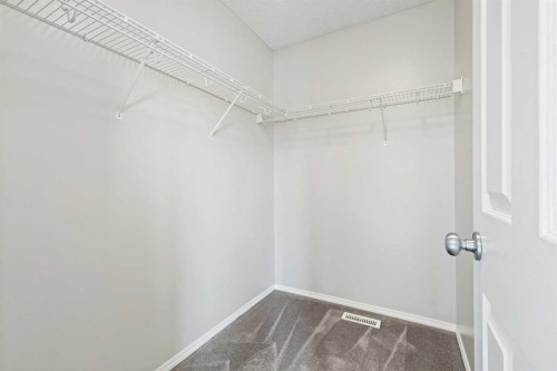 64 Elgin Gardens Se, Calgary, AB - Indoor With Storage
