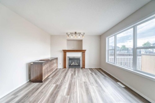 106 Saddletree Drive Ne, Calgary, AB - Indoor Photo Showing Living Room With Fireplace