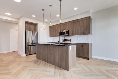 227 Sora Terrace Se, Calgary, AB - Indoor Photo Showing Kitchen With Upgraded Kitchen