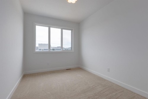 291 Sora Boulevard Se, Calgary, AB - Indoor Photo Showing Other Room