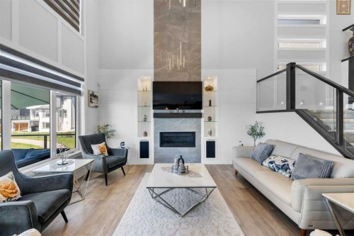 20 Waterford Heights, Chestermere, AB - Indoor Photo Showing Living Room With Fireplace
