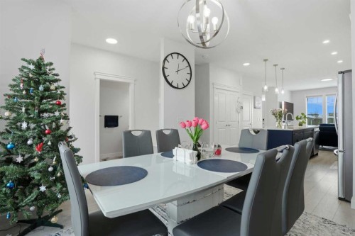 496 Reynolds Avenue Sw, Airdrie, AB - Indoor Photo Showing Dining Room