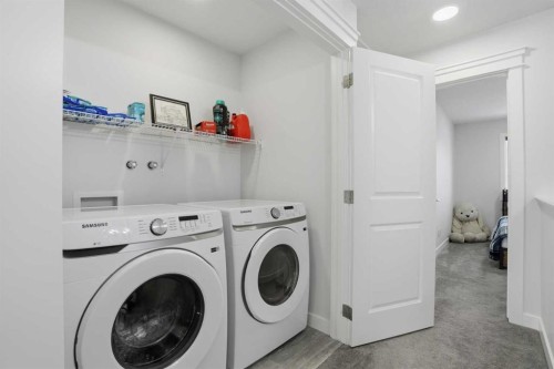 496 Reynolds Avenue Sw, Airdrie, AB - Indoor Photo Showing Laundry Room