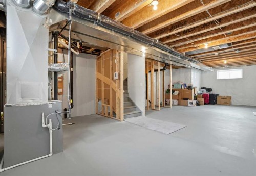 496 Reynolds Avenue Sw, Airdrie, AB - Indoor Photo Showing Basement