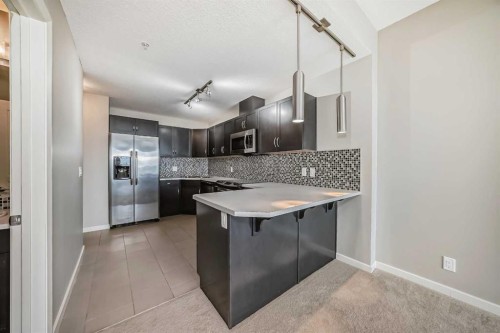 1601-1320 1 Street Se, Calgary, AB - Indoor Photo Showing Kitchen With Upgraded Kitchen