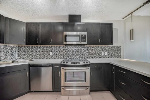 1601-1320 1 Street Se, Calgary, AB - Indoor Photo Showing Kitchen With Stainless Steel Kitchen With Upgraded Kitchen