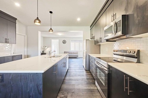 155 Carringham Road Nw, Calgary, AB - Indoor Photo Showing Kitchen With Upgraded Kitchen