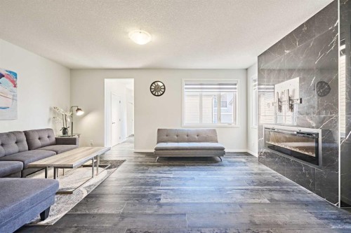 155 Carringham Road Nw, Calgary, AB - Indoor Photo Showing Living Room