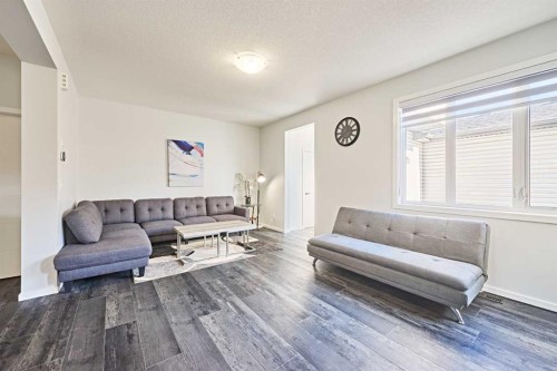 155 Carringham Road Nw, Calgary, AB - Indoor Photo Showing Living Room