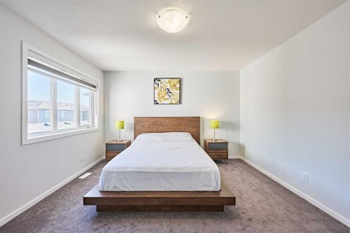 155 Carringham Road Nw, Calgary, AB - Indoor Photo Showing Bedroom