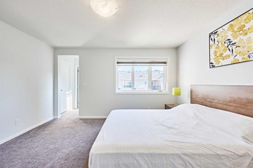 155 Carringham Road Nw, Calgary, AB - Indoor Photo Showing Bedroom
