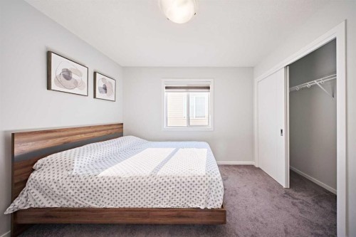 155 Carringham Road Nw, Calgary, AB - Indoor Photo Showing Bedroom