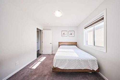 155 Carringham Road Nw, Calgary, AB - Indoor Photo Showing Bedroom
