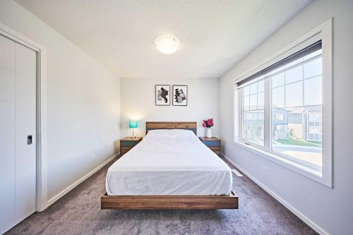 155 Carringham Road Nw, Calgary, AB - Indoor Photo Showing Bedroom