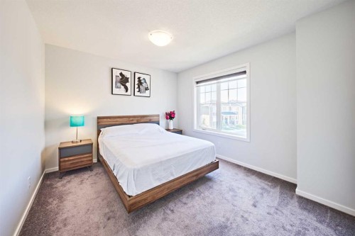 155 Carringham Road Nw, Calgary, AB - Indoor Photo Showing Bedroom