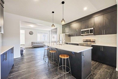 155 Carringham Road Nw, Calgary, AB - Indoor Photo Showing Kitchen With Upgraded Kitchen