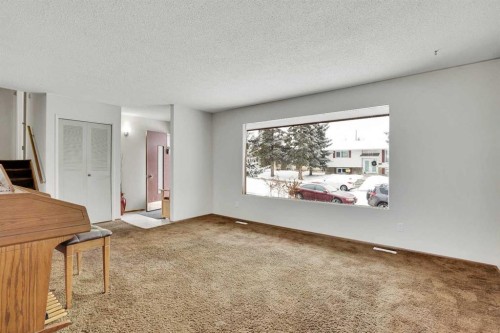 107 Silver Brook Drive Nw, Calgary, AB - Indoor Photo Showing Living Room