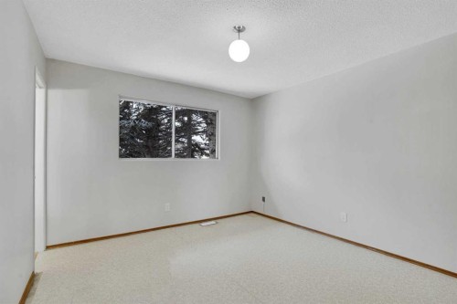 107 Silver Brook Drive Nw, Calgary, AB - Indoor Photo Showing Other Room