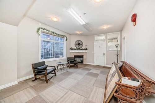 301-2320 Erlton Street Sw, Calgary, AB - Indoor With Fireplace