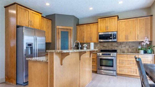 52 Elmont Green Sw, Calgary, AB - Indoor Photo Showing Kitchen With Stainless Steel Kitchen