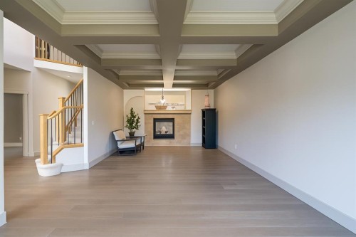 52 Elmont Green Sw, Calgary, AB - Indoor Photo Showing Other Room With Fireplace