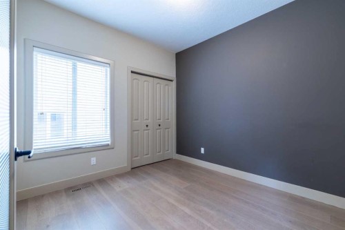 52 Elmont Green Sw, Calgary, AB - Indoor Photo Showing Other Room