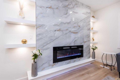 152 Southampton Drive Sw, Calgary, AB - Indoor Photo Showing Other Room With Fireplace