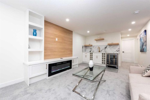 152 Southampton Drive Sw, Calgary, AB - Indoor Photo Showing Living Room With Fireplace