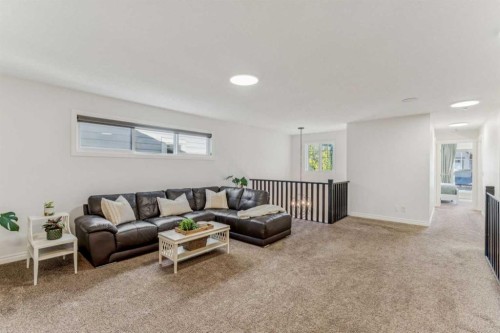 50 Riviera View, Cochrane, AB - Indoor Photo Showing Living Room