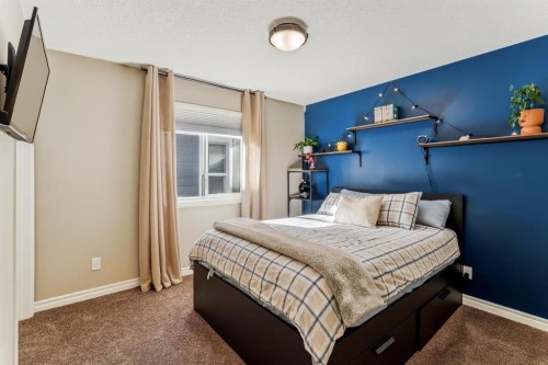 50 Riviera View, Cochrane, AB - Indoor Photo Showing Bedroom