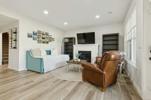 50 Riviera View, Cochrane, AB - Indoor With Fireplace