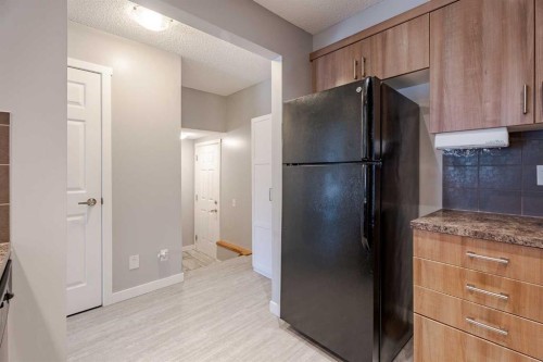 3098 Windsong Boulevard Sw, Airdrie, AB - Indoor Photo Showing Other Room