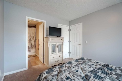 3098 Windsong Boulevard Sw, Airdrie, AB - Indoor Photo Showing Bedroom