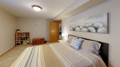 716 55 Avenue Sw, Calgary, AB - Indoor Photo Showing Bedroom