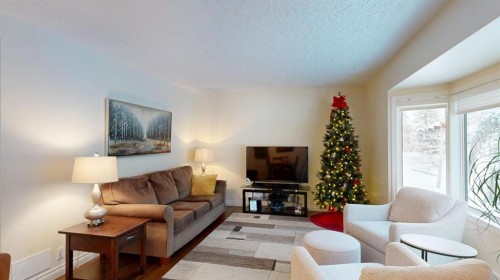716 55 Avenue Sw, Calgary, AB - Indoor Photo Showing Living Room