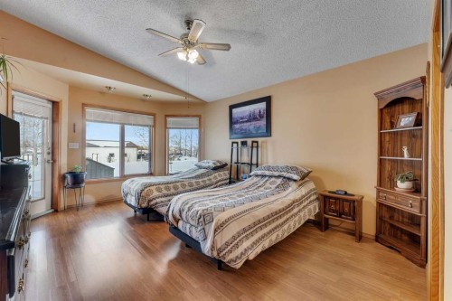 283058 Township Road 245A, Rural Rocky View County, AB - Indoor Photo Showing Bedroom