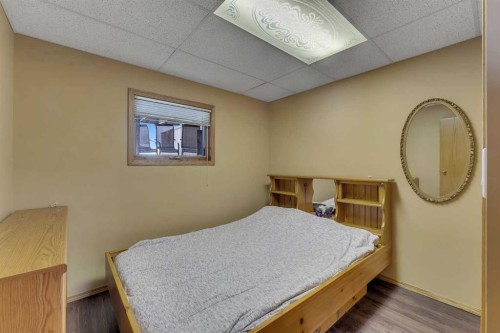 283058 Township Road 245A, Rural Rocky View County, AB - Indoor Photo Showing Bedroom