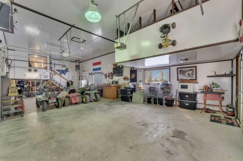 283058 Township Road 245A, Rural Rocky View County, AB - Indoor Photo Showing Garage