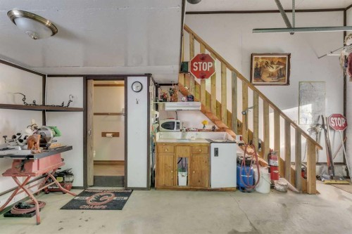 283058 Township Road 245A, Rural Rocky View County, AB - Indoor Photo Showing Garage